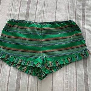 Green with multicolor striped shorts